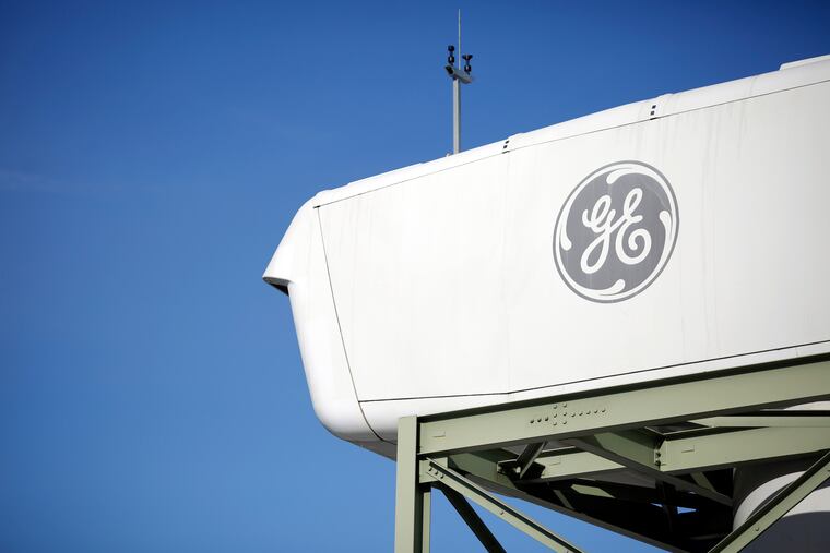 A logo is displayed on a wind turbine used for training and research outside of the General Electric energy plant in Greenville, S.C.