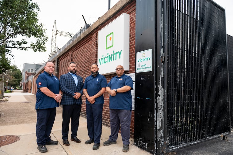 Members of IBEW Local 614 (from left): Sean Finnegan; Kenneth Gordy; Larry Anastasi, president and business manager of the union local; and Thomas White. The steam plant workers are negotiating a new contract with Vicinity.