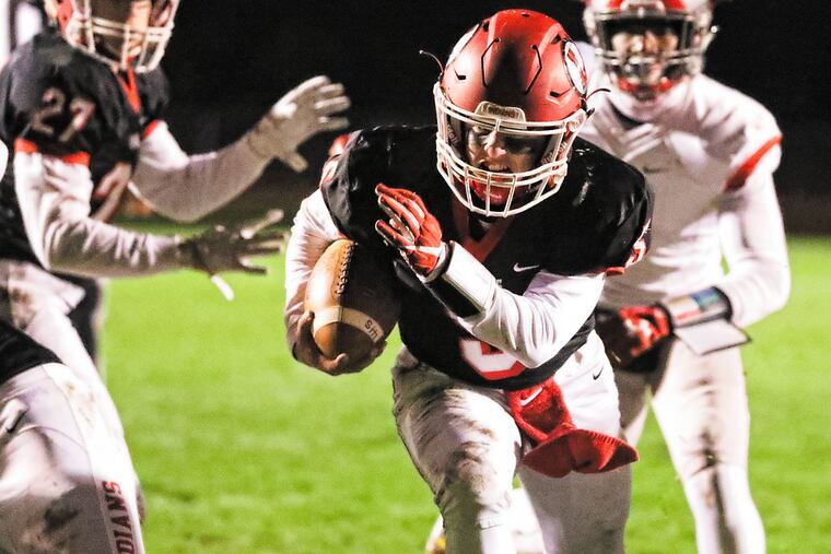 Lenape QB Matt Lajoie scores a touchdown in the first quarter.