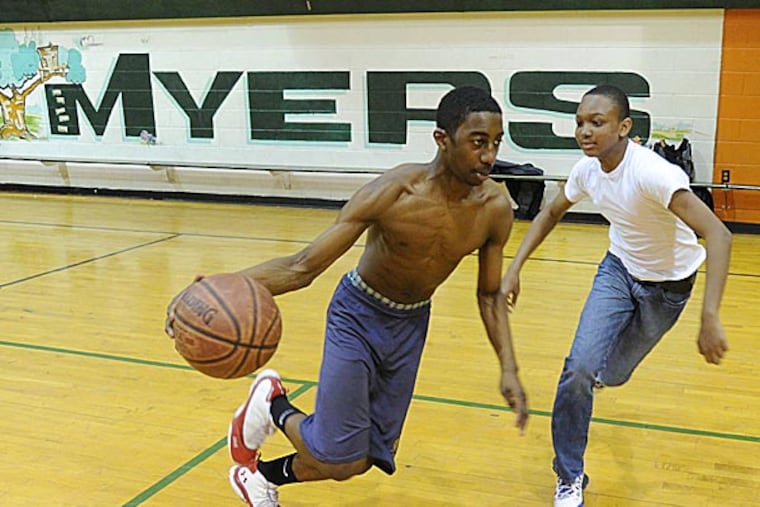 Together on the courts of Myers Recreation Center, Bernard Tyler and Tyrone Garland tirelessly perfected the shot that propelled La Salle into the Sweet 16. (Clem Murray/Staff Photographer)
