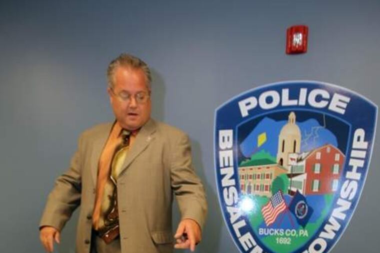 Boy, are they busted
Fred Harran, Bensalem Township's director of public safety, explains Monday how his department seized more than 15 kilograms of heroin and 20 pounds of meth over the weekend. Bensalem police arrested two men from California and seized drugs that they said had an estimated street value of $11.7 million. About 6:45 p.m. Sunday, officers in the area of State Road and American Drive saw a suspicious blue tractor-trailer in the area. Turns out, the cornucopia of narcotics shown in this photo was stashed in the truck. The men were arraigned and sent to Bucks County Prison on $1 million bail each.
MICHAEL BRYANT / Staff Photographer