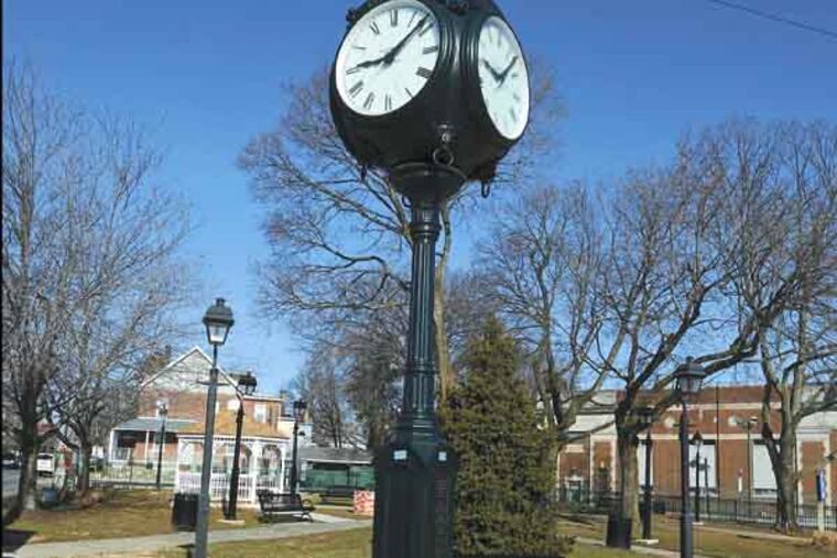 The clock tower in the center of Fox Chase around the SEPTA Loop in Fox Chase. ( RON TARVER / Staff Photographer )