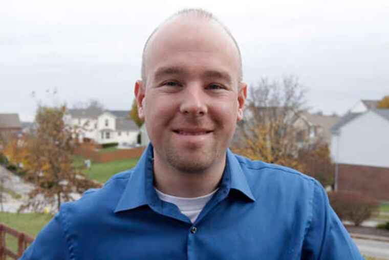 Gary Staten, a U.S. Marine veteran, at his home in Hebron, Ky. He credits Easter Seals TriState with helping him find a job with FedEx just weeks after his discharge. AP Photo