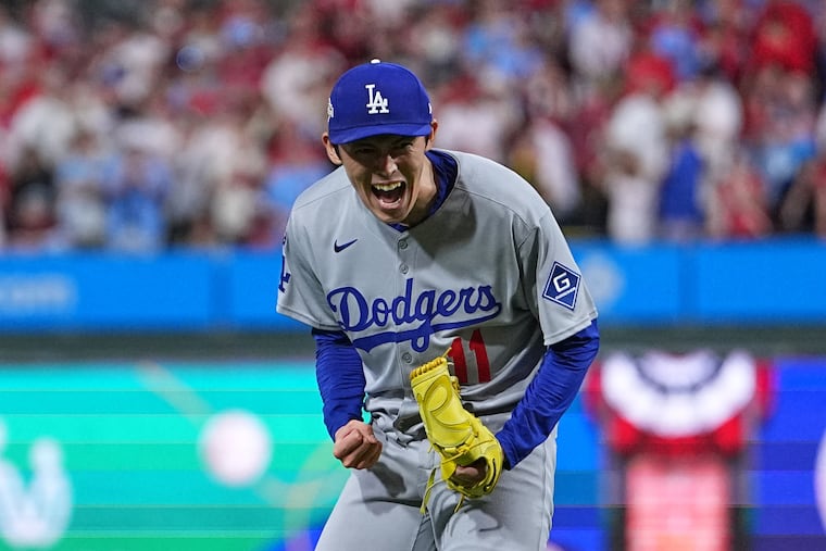 Reliever Roki Sasaki reacts after the Dodgers defeated the Phillies in Game 1 of the National League Division Series on Saturday.