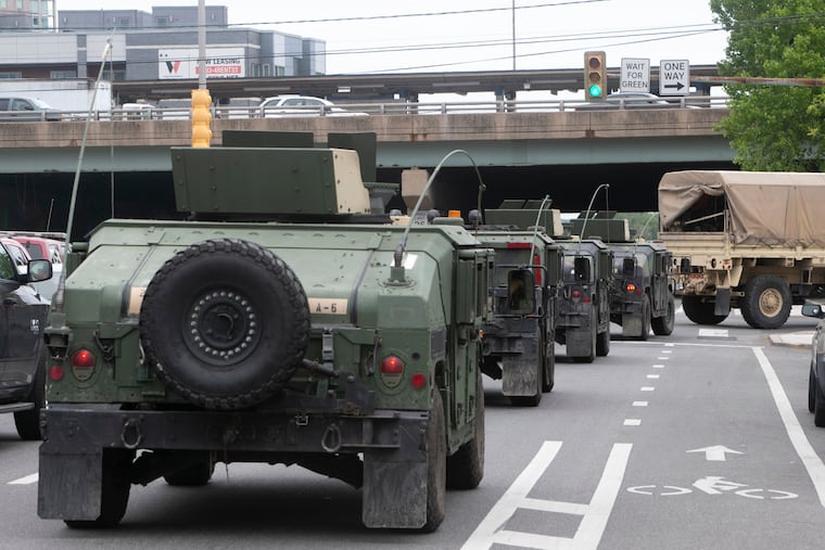A Pennsylvania National Guard caravan on Spring Garden Street in Philadelphia on Tuesday, June 2, 2020. Officials said 500 were heading to the region Tuesday to join 1,000 already in the city and 100 in neighboring Delaware County to help with George Floyd protests.