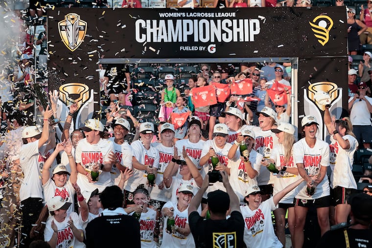 Maryland Charm players celebrate after winning the inaugural Women's Lacrosse League Championship at Subaru Park.