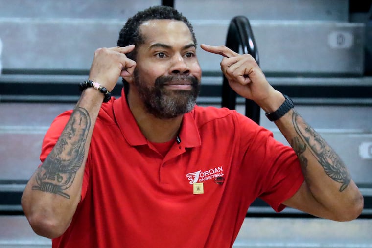 Former NBA and UNC star Rasheed Wallace directs the team as he coaches at Jordan High School in Durham, NC on Tuesday Feb. 11, 2020. Wallace's own high school coach, Bill Ellerbee, a Philadelphia legend at Simon Gratz High, came to the game to watch his former student in action.