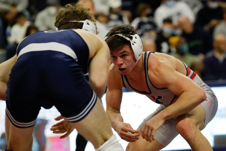 Penn's Doug Zapf (right) taking on Penn State's Terrell Barraclough during their match on Dec. 3.