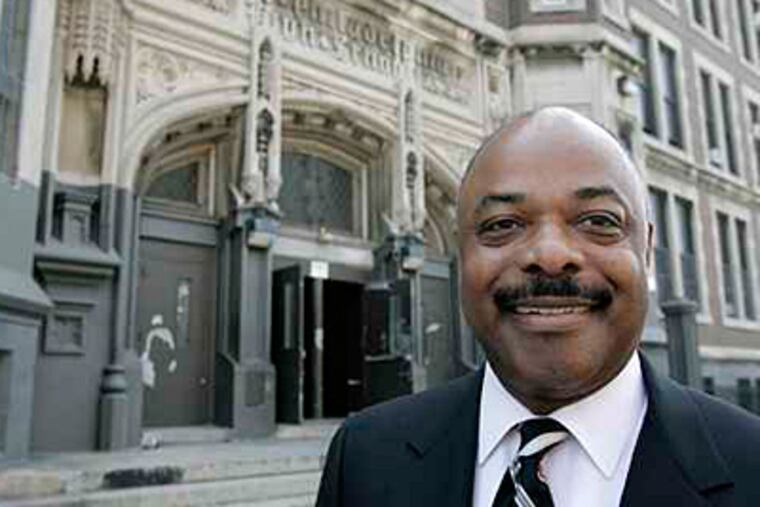 Jerry Jordan, president, Philadelphia Federation of Teachers, poses for photo in front of West Philly High School. (Akira Suwa / Inquirer