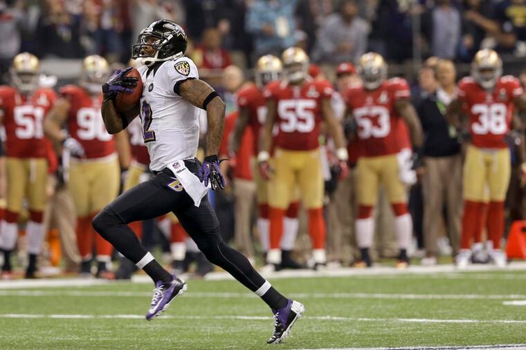 Baltimore Ravens wide receiver Jacoby Jones, who ran back a kickoff for a touchdown against the 49ers in last season's Super Bowl, was -- according to a TMZ report -- injured when a stripper hit him in the head with a champagne bottle. (Associated Press)