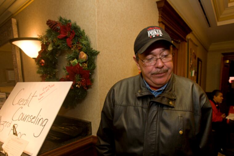 Victor Torres, 49, lost his doorman's job at Ceasars in November. He says he's afraid his wife could be next: "If she gets laid off, we will lose our house. We will lose everything."