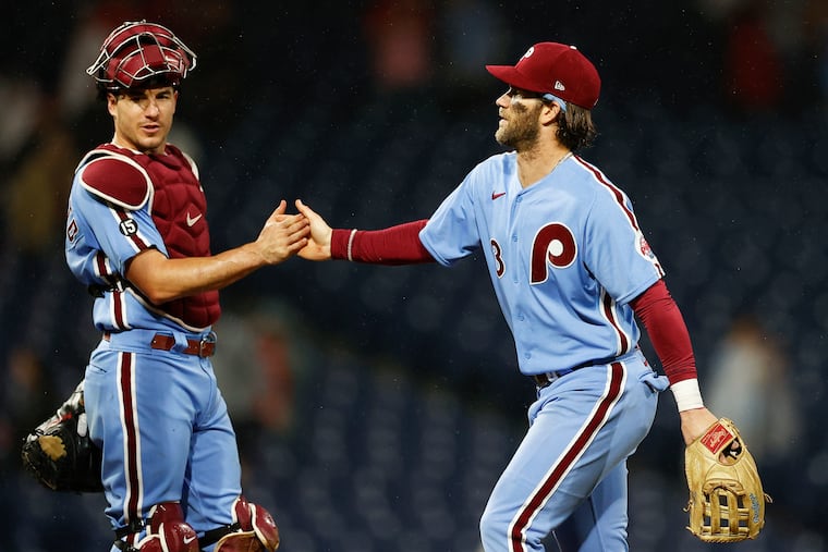 Bryce Harper and J.T. Realmuto were finalists for the Silver Slugger Award, which Harper won on Nov. 11.