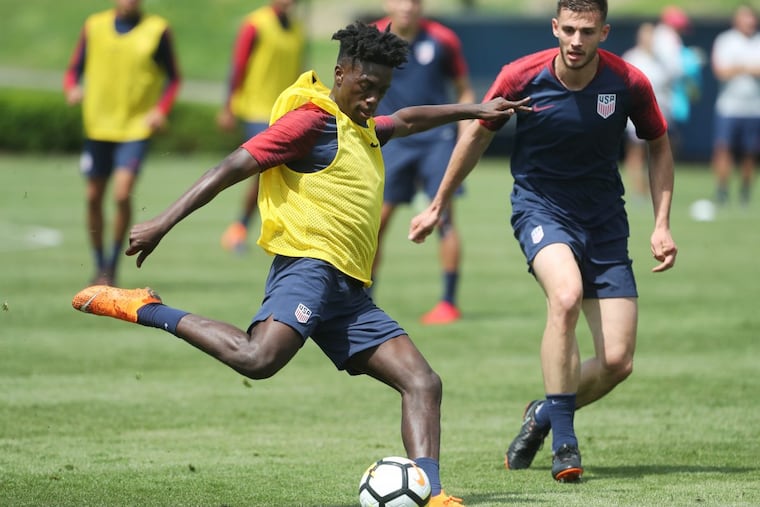 Tim Weah (center) made his debut for the United States men’s national soccer team in March, and is rising at French club Paris Saint-Germain.