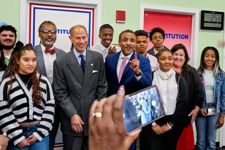 Prince Edward, Duke of Edinburgh, poses with students during a visit to Constitution High School. The School District of Philadelphia is the first urban school district in America to participate in the Duke of Edinburgh's International Award, a global youth achievement award that challenges young people aged 14-24 to develop skills, confidence, and resilience. To his right is Superintendent Tony B. Watlington. School board president Reginald Streater is with bowtie at left, and Constitution principal Brianna Robb is second from right.