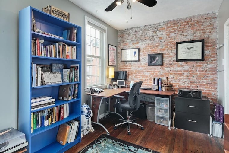 738 N. Taylor St. in Philadelphia's Fairmount neighborhood features exposed brick walls. It's on the market for $385,000.