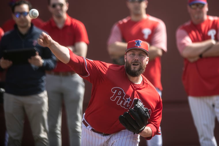 Tommy Hunter throws a bullpen session during spring training in February.