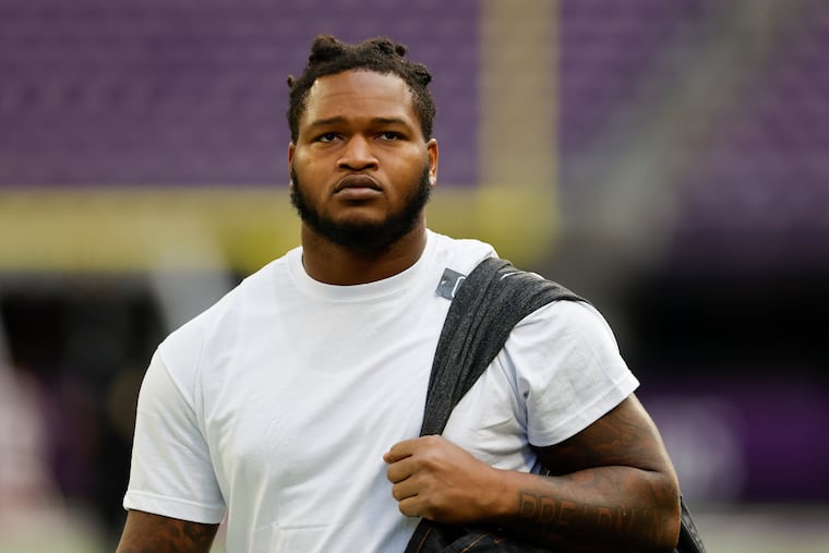 Eagles defensive tackle Jalen Carter on the field before the game against the Vikings.