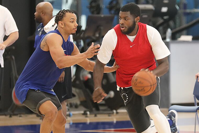 76ers Pre-Draft Workouts at the 76ers Training Complex in Camden, NJ Ñ Justin Robinson (left) and Eric Paschall are at during the workout
06-08-2019 AKIRA SUWA / For The Inquirer.