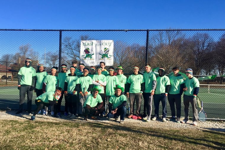 The Central and St. Joseph’s Prep tennis teams pose after Saturday’s matches. Central coach Mike Horwits (front left) and St. Joe’s coach Mark Kravetz (front right) created the Clash in the City.