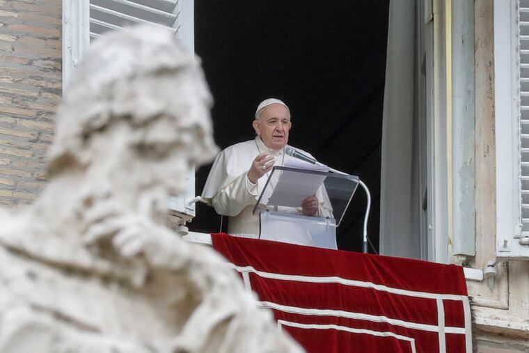 Pope Francis speaking from the window of his studio overlooking St. Peter's Square at the Vatican on Dec. 8.