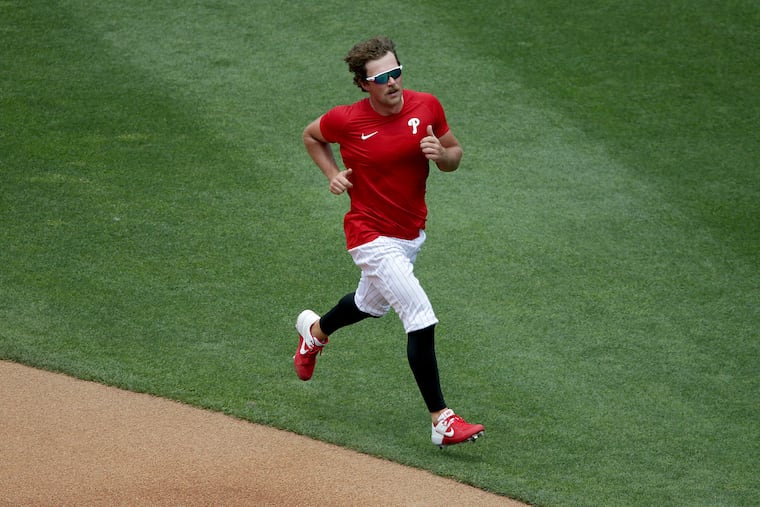 First baseman Rhys Hoskins jogs during a Phillies training-camp workout this week at Citizens Bank Park.