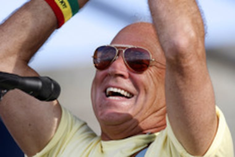 Jimmy Buffett performing in August at the Newport Folk Festival; he's cashed in on his image in recent years.