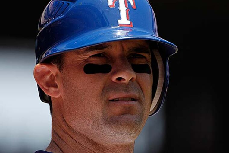 Michael Young said he's ready to "pour everything I have into third" base. (Tony Gutierrez/AP file photo)