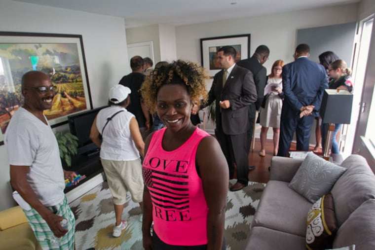 Latoya Wright, who had been on the waiting list for public housing for over a decade, in a new
Philadelphia Housing Authority housing unit in Strawberry Mansion. (ALEJANDRO A. ALVAREZ / Staff Photographer)