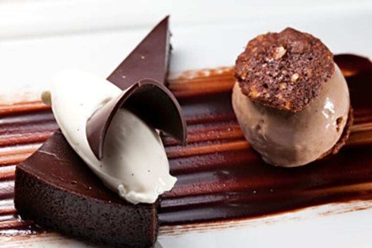 Chocolate decadence and a chocolate hazelnut "chipwich." ( David M Warren / Staff Photographer )