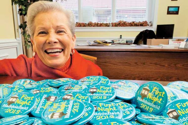 Haddonfield Mayor Tish Colombi with First Night buttons at the Haddonfield Information Center, December 27, 2012. ( DAVID M WARREN / Staff Photographer )