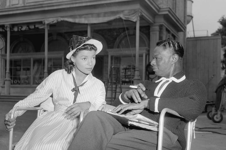 Ruby Dee and Nat "King" Cole on the set of "St. Louis Blues" in 1957. Dee starred in Shakespeare but also took roles in soap operas such as "The Guiding Light." She won an Emmy and a Grammy and was nominated for an Oscar.