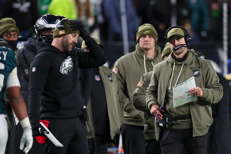 Eagles offensive coordinator Kevin Patullo (right) has been under fire as the team's offense has taken a big step back from last year.