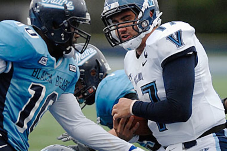 Villanova quarterback Chris Whitney (17) is known as a runner, but has found recent success relying on his arm. (AP Photo/Michael C. York)
