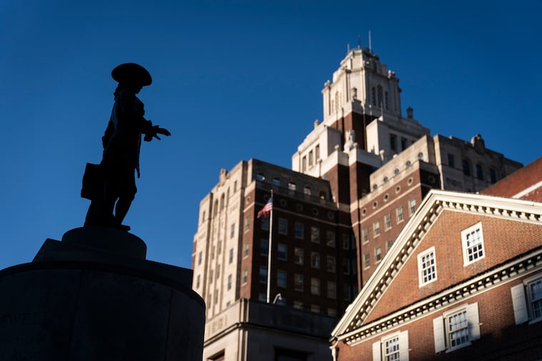 A statue of William Penn stands at Welcome Park on Monday.