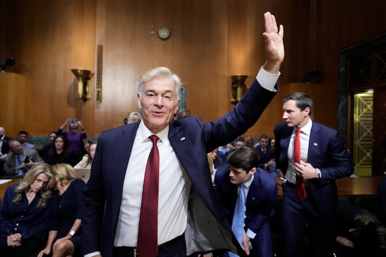 Dr. Mehmet Oz, President Donald Trump's pick to lead the Centers for Medicare and Medicaid Services, waves at the conclusion of his confirmation hearing before the Senate Finance Committee, on Capitol Hill in Washington, in March.