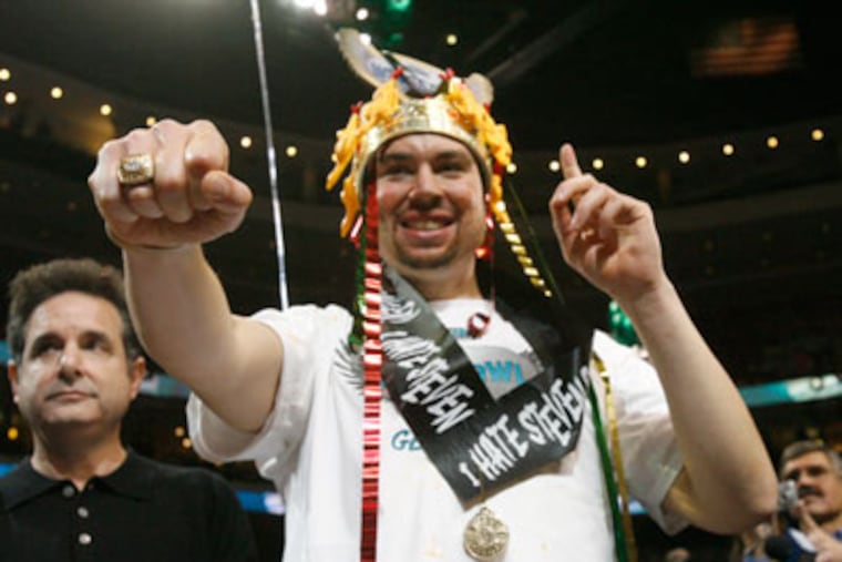 Jonathan "Super Squibb" Squibb celebrates his third consecutive crown at Wing Bowl 19. (Alejandro A. Alvarez / Staff Photographer)
