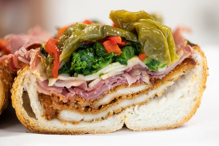 The Chicken Cutlet Lagasse includes prosciutto, long hots, sharp provolone,and broccoli rabe at Cosmi’s Deli Philadelphia, Pa. on Wednesday, May 17, 2023.
