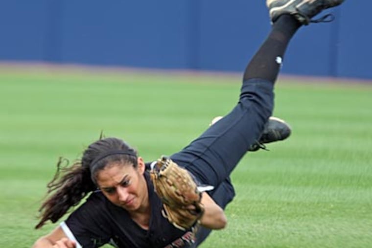 Hatboro-Horsham's Melissa Spinosa snags a pop fly during the 3rd inning. (Steven M. Falk/Staff Photographer)