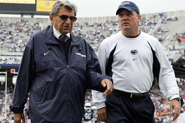 Tom Bradley (right) will serve as Penn State's interim head coach in place of Joe Paterno. (Carolyn Kaster/AP file photo)