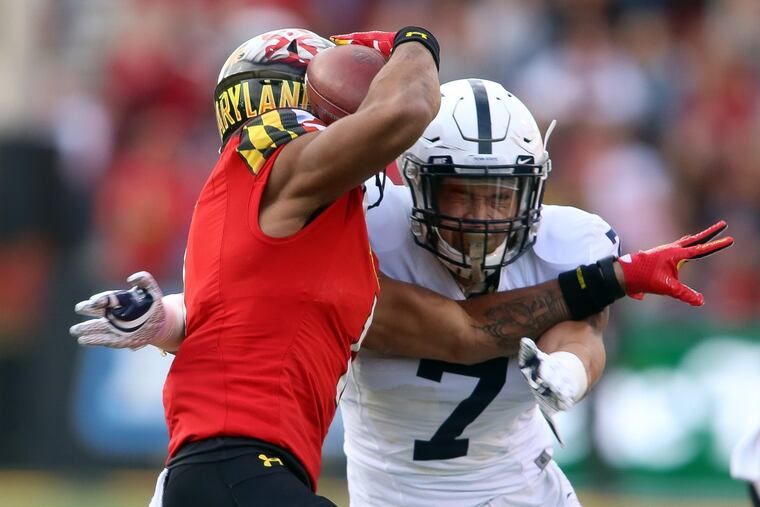 Penn State’s Koa Farmer (7) tackling Maryland wide receiver D.J. Moore during a game last November.