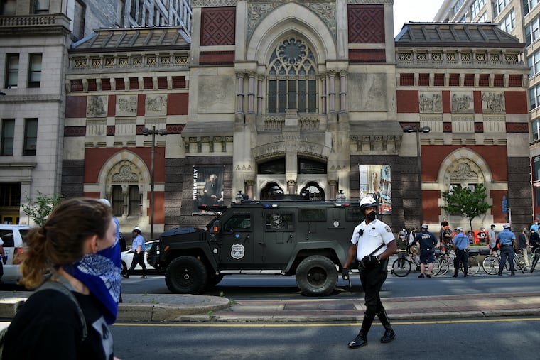 A police armored vehicle passes in front of the Pennsylvania Academy of the Fine Arts (PAFA) as protesters march from the Police Administration Building to their eventual teargassing on I-676 June 1, 2020, as demonstrations continue in the city following the death of George Floyd.