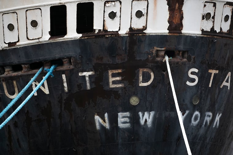 Paint peels off the SS United States at Pier 82 in Philadelphia in 2021. The ship was the fastest passenger ship built and the largest ever made in the U.S., according to the SS United States Conservancy.