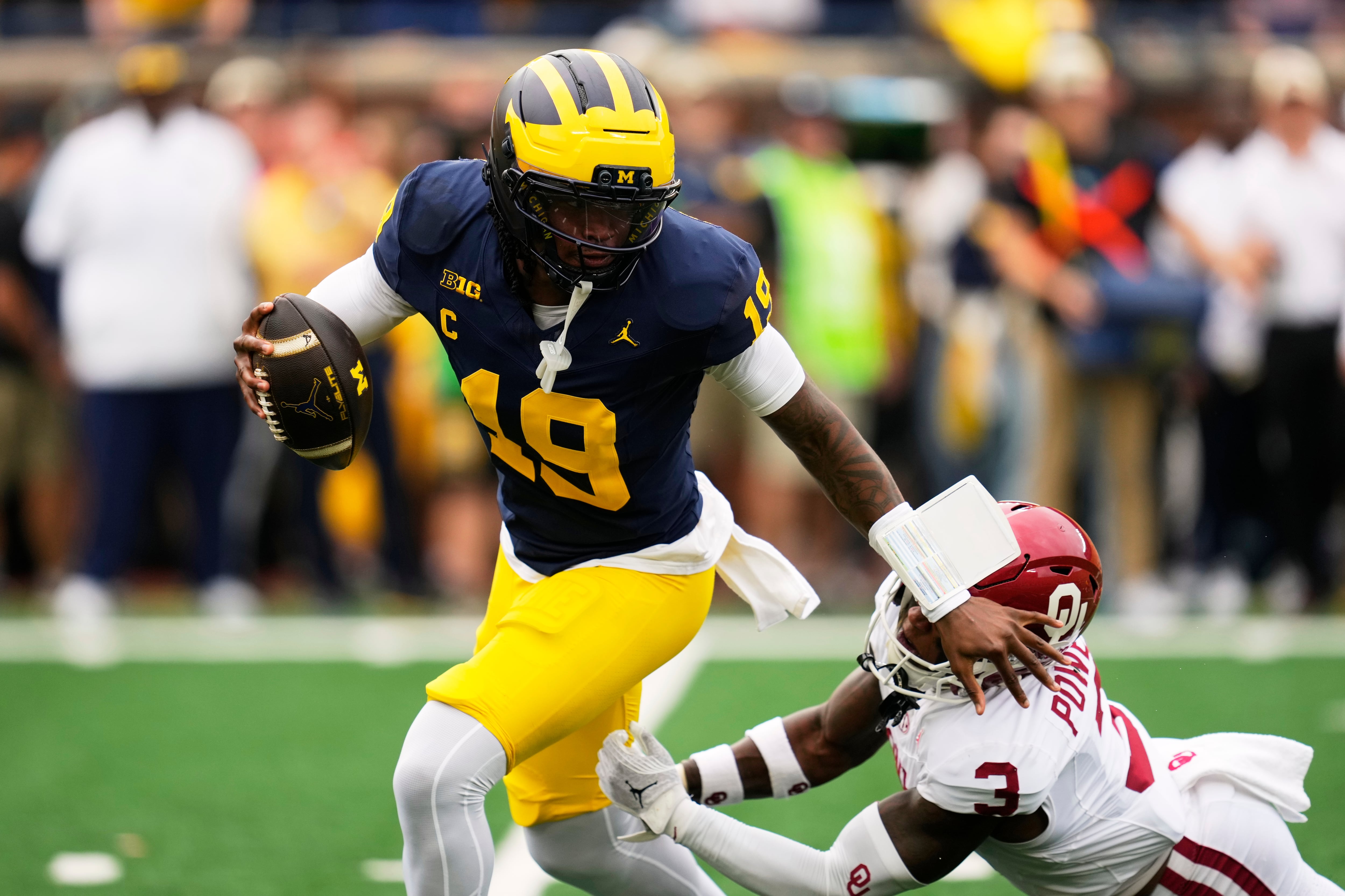 Michigan bounces back and beats No. 11 Oklahoma 17-10 after an INT late in game sets up go-ahead TD