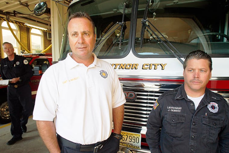 Firefighters at the Ventnor Fire House (from left) Chief John Haglett and Lt. Joe Deibert talk about Superstorm Sandy Tuesday, Oct. 29, 2013. ( AKIRA SUWA / Staff Photographer )
