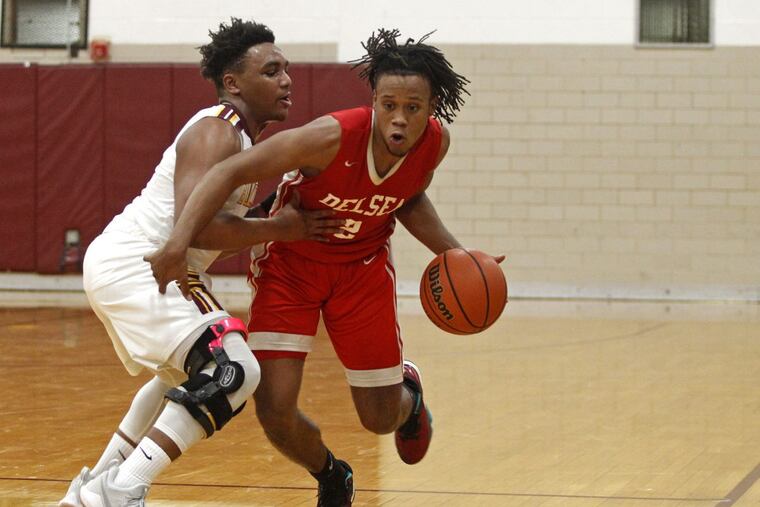 Delsea senior Aziz Saud (with basketball) scored eight points in a 65-38 win over Glassboro.