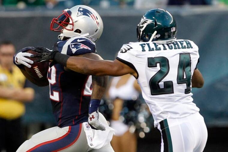 Bradley Fletcher goes after Patriots running back Stevan Ridley. (Ron Cortes/Staff Photographer)