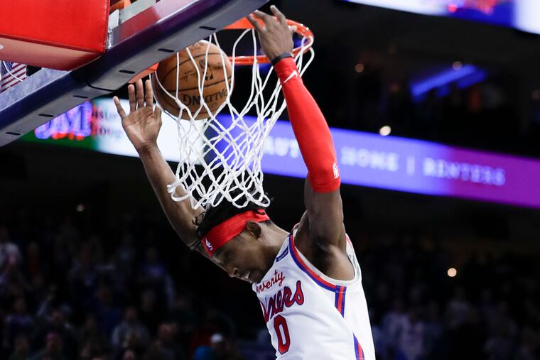 Sixers guard Josh Richardson dunks during a win over the Celtics on Jan. 9.
