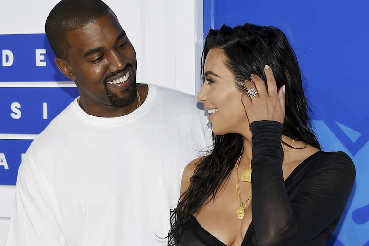 Kanye West and Kim Kardashian West arrive at the MTV Video Music Awards at Madison Square Garden on Sunday, Aug. 28, 2016, in New York.