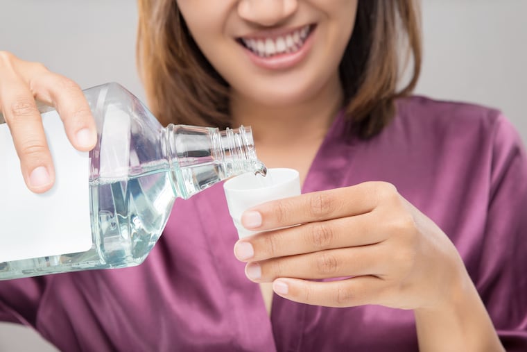 Researchers are studying whether mouthwash helps reduce the spread of coronavirus