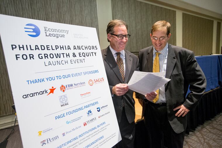 Philadelphia Anchors for Growth and Equity launched a first-ever citywide effort to get universities and hospitals to buy local. Jeff Hornstein, left, Executive Director of the Economy League of Greater Philadelphia, speaks with Kurt Sommer, Director of Baltimore Integration Partners. CHARLES FOX / Staff Photographer